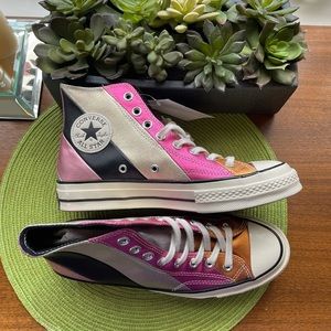 Converse high tops leather uppers.